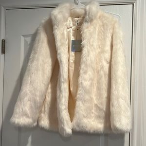 Missguided Faux fur cream jacket size 6. New with tags.